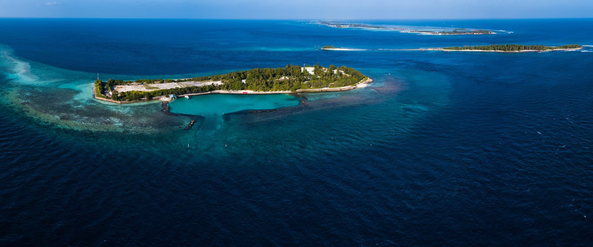 Maldives overwater bungalows at a resort in a turquoise lagoon